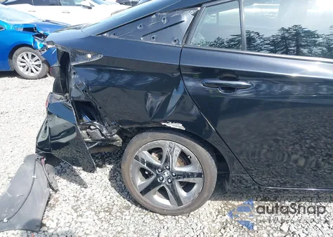 2021 Toyota Prius Xle z USA, uszkodzony, nr VIN JTDKAMFU8M3136565